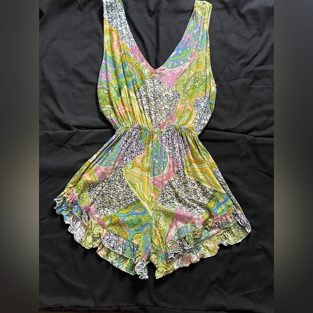 patchwork romper, size xs, with a open back and is super flowy and comfortable!